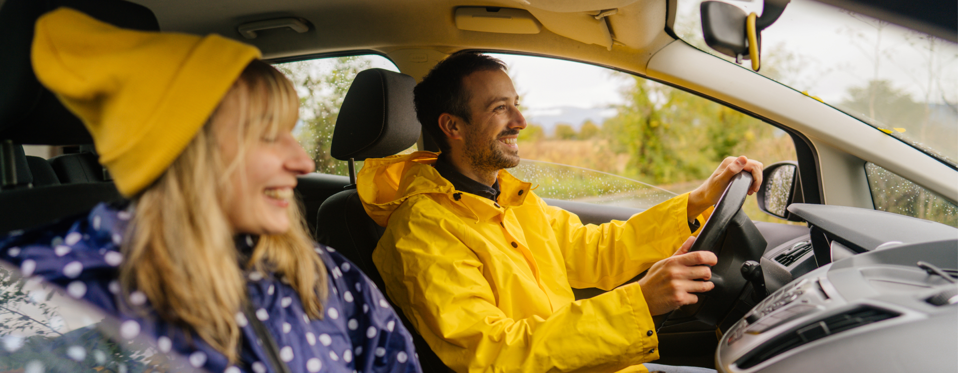 Couple happily driving